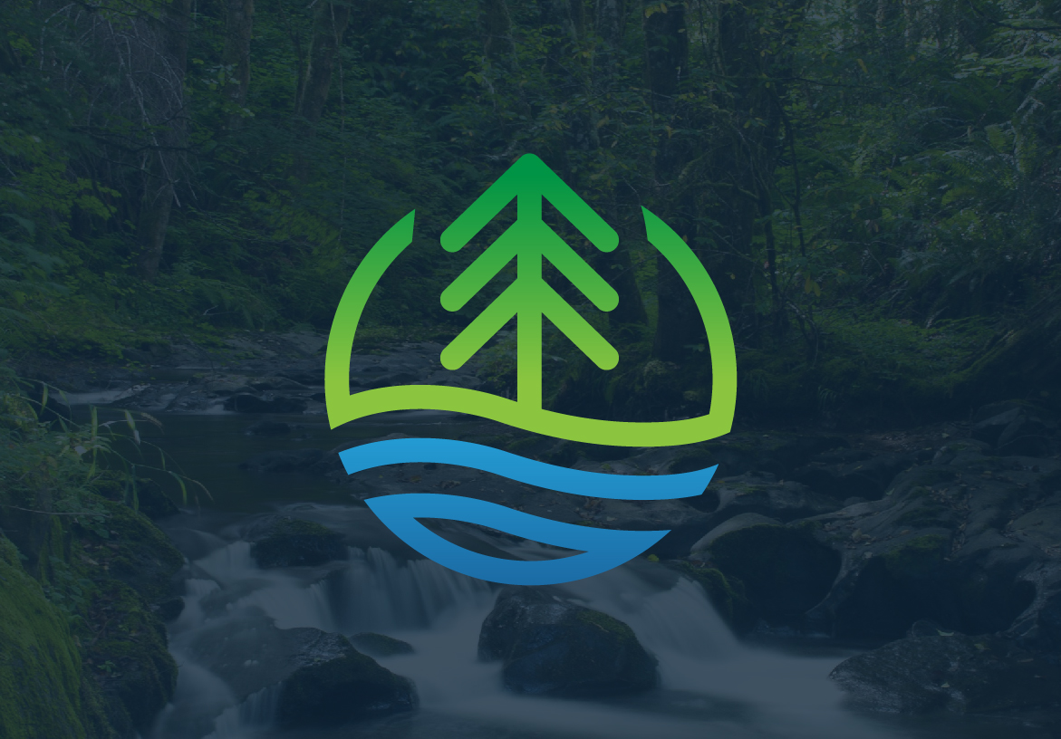 Falls Creek Retreat Center logo with green tree and blue river icon, subtly displayed over a blurred forest and stream background.