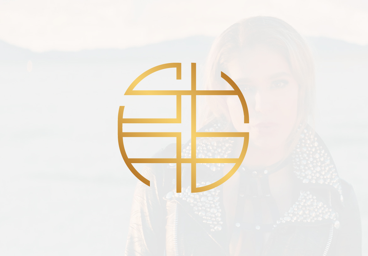The standalone golden logo design for Persian singer SHAB, a stylized circular icon with abstract, interconnected lines.